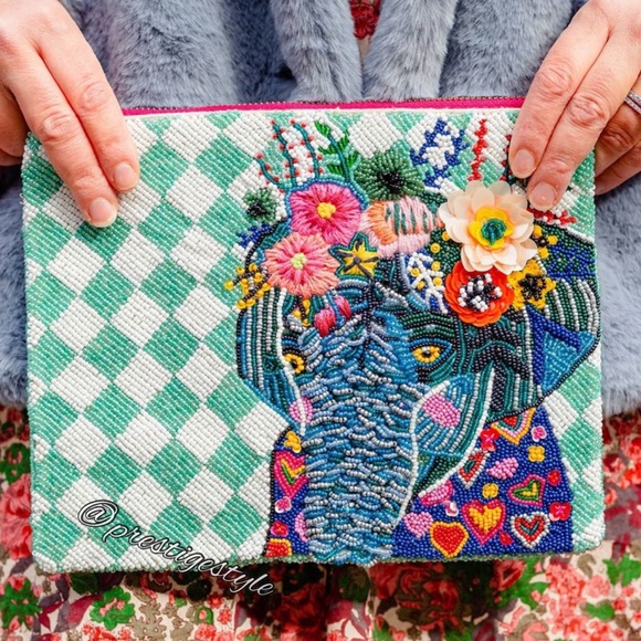 Anthropologie Handbags - ANTHROPOLOGIE Elephant Embellished Pouch